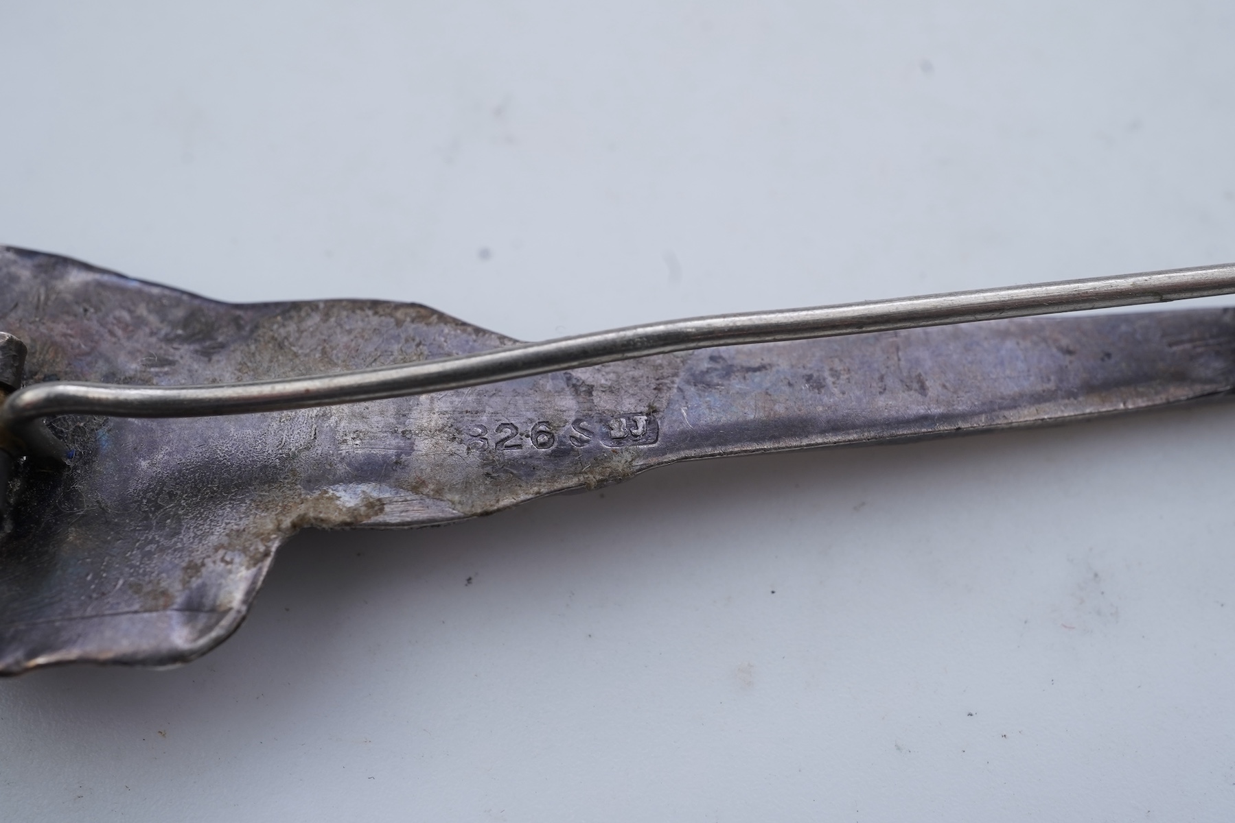 A collection of five Arts & Crafts silver brooches, Denmark, early-mid 20th century